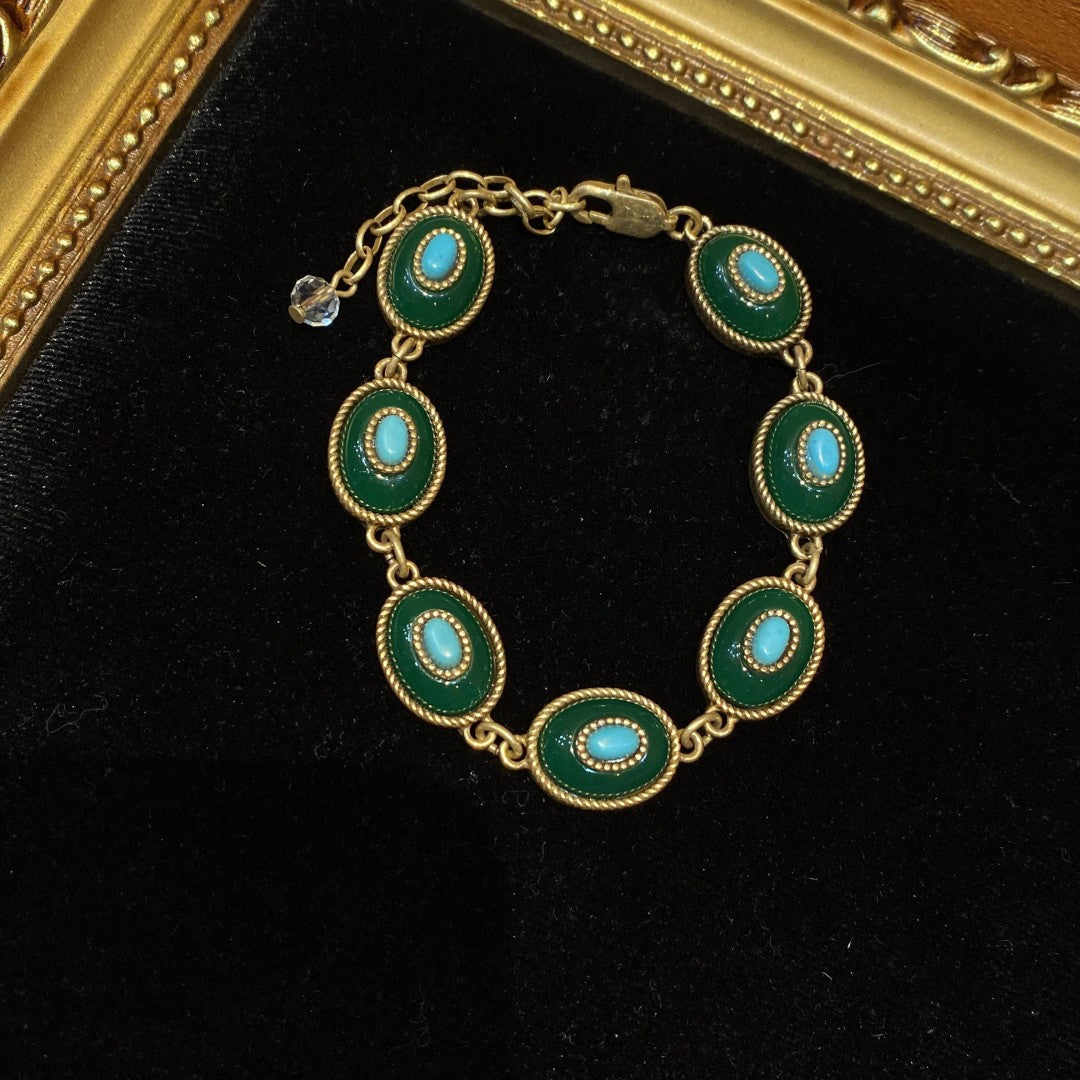 vintage style brass 18k-gold oval shape with dark green polymer resin and turquoise bracelet