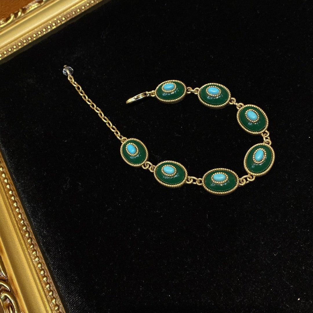 vintage style brass 18k-gold oval shape with dark green polymer resin and turquoise bracelet