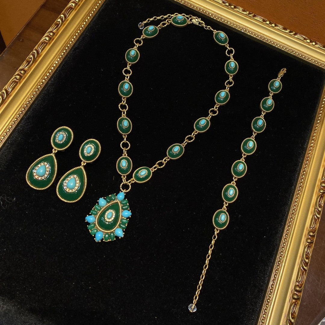 vintage style brass 18k-gold oval shape with dark green polymer resin and turquoise bracelet