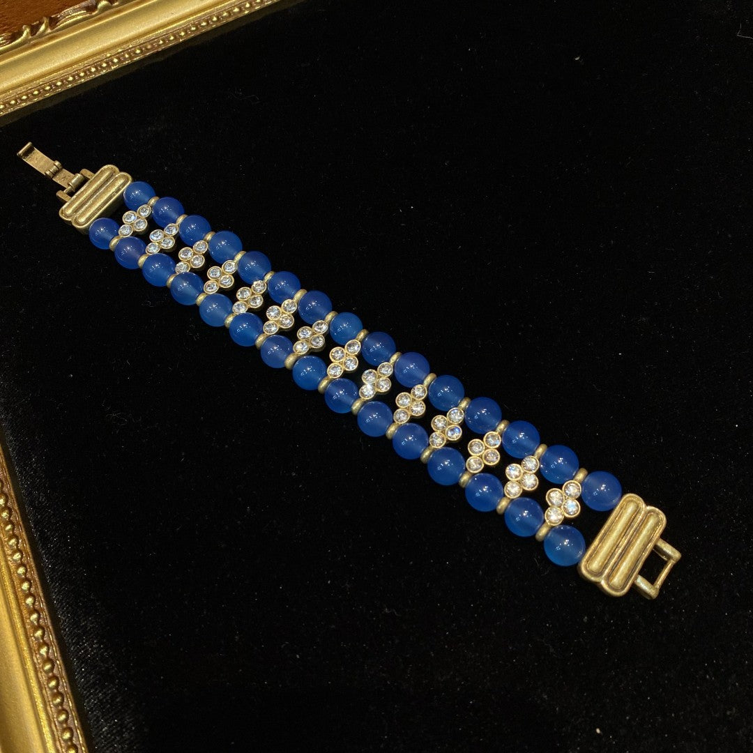 Vintage style 18k-gold plated brass bracelet with blue natural stone beads and rhinestones.