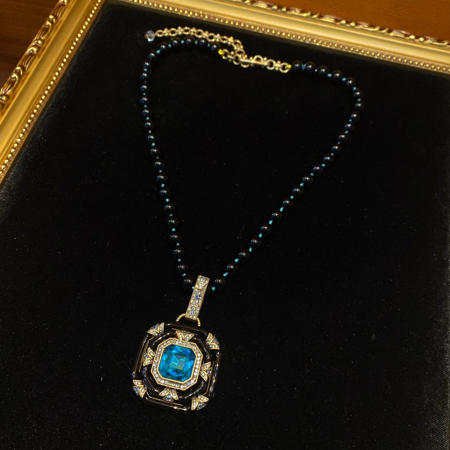 Vintage style designed brass 18k-gold plated square pendant necklace with black enamelled and blue main rhinestone in the middles