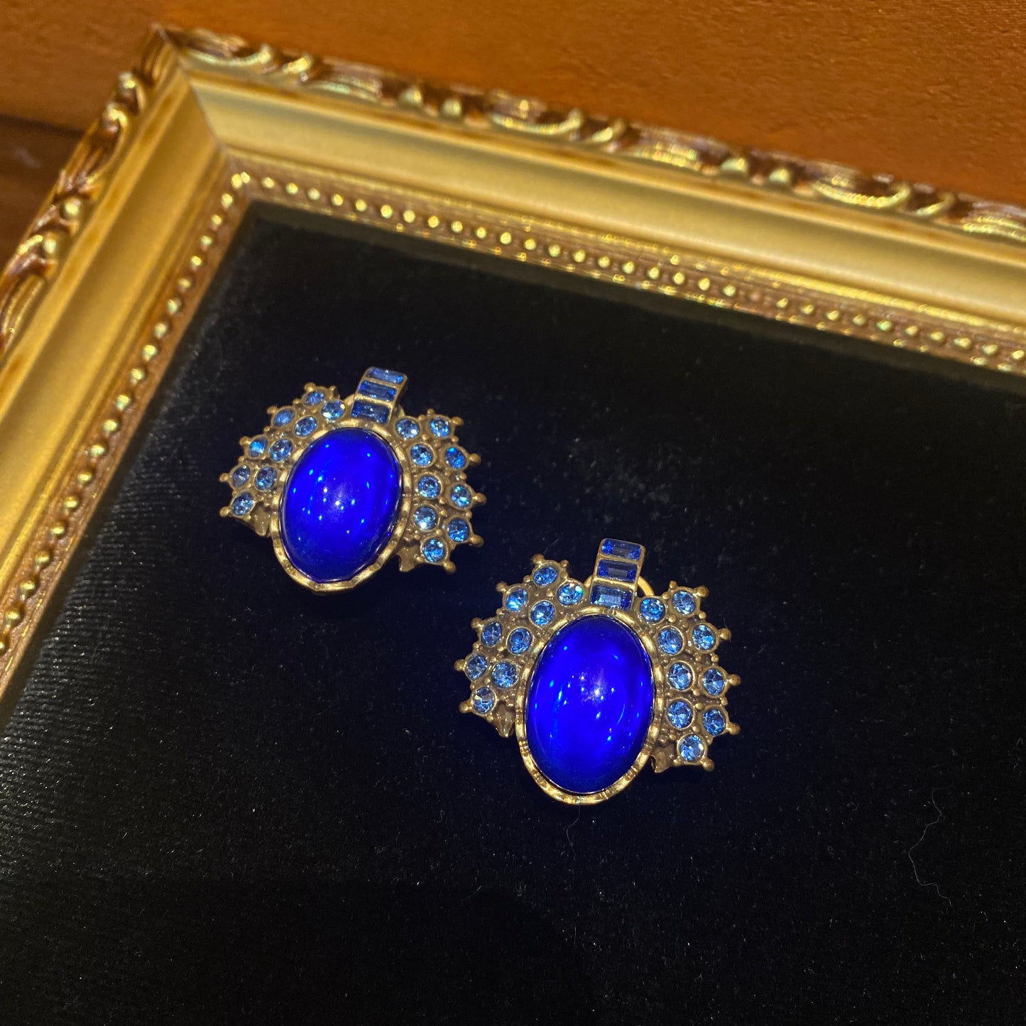 vintage style 18k-gold plated earrings made by oval blue coloured glaze with blue rhinestones in  firework shape gorgerous & chariming